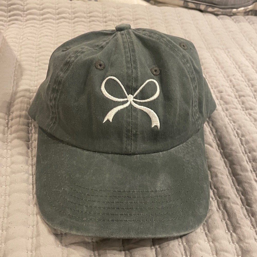 Olive Green Cap with White Bow Embroidery. Brand new and bought in a boutique.